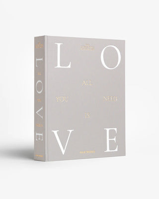 Book titled 'All You Need is Love' on a white background