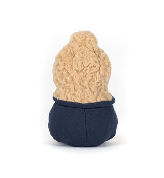 Back of Small peanut plush toy with a beige top and navy bottom on a white background
