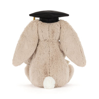 Plush beige bunny toy wearing a graduation cap on a white background