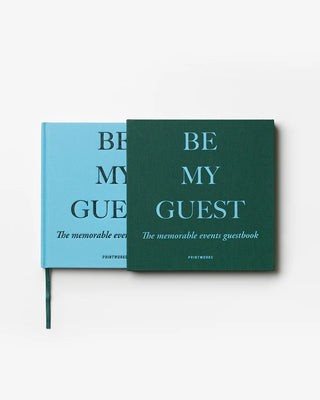 Blue guestbook in a matching green display box with title 'Be My Guest' text on a white background.