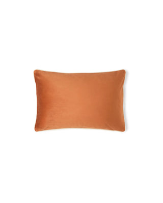 Orange rectangular pillow on a white background