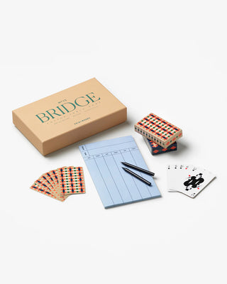 Card game set with 'Bridge' packaging on a white background with cards, score pads and pencils