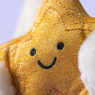 Gold star-shaped plush toy with a smiley face and silver flecks on a white background