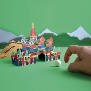 World Flick golf with Russian monument, golf ball and hand against a green background