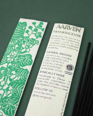 Aarven Frankincense incense stick packaging with green floral design on a dark green background