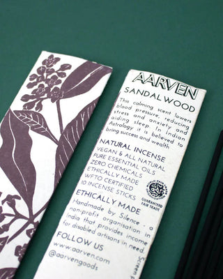 Aarven Sandalwood incense packaging with botanical design on a green background