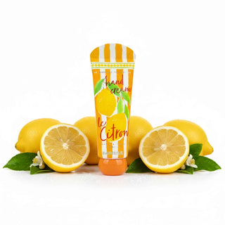 Hand cream with Orange & white stripes with lemon design surrounded by lemons on a white background