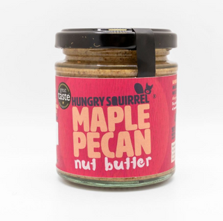 Jar of Hungry Squirrel Maple Pecan nut butter with a red label on a white background