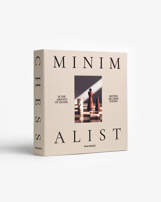 Book titled 'Minimalist' with a minimalistic design and photo of a chess set on a white background