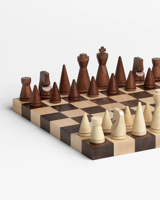 Wooden chess set with checkered board on a white background