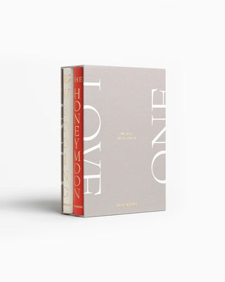 Two books titled 'Honeymoon' and 'Wedding' in a grey display box on a white background