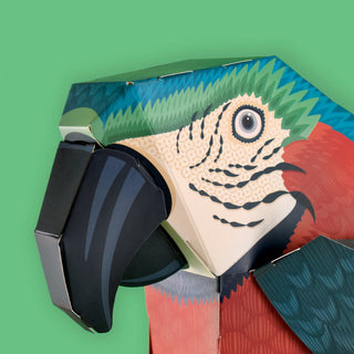 close up of the face of a 3d paper parrot