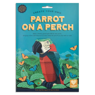 Parrot On A Perch Packaging blue with yellow text and parrot motif with florals and butterflies set against a white background