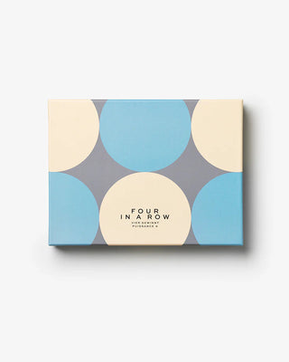 Board game box with blue and beige circles on a white background