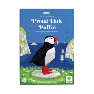 Packaging for a 'Proud Little Puffin' craft kit with puffin illustration on a blue background.