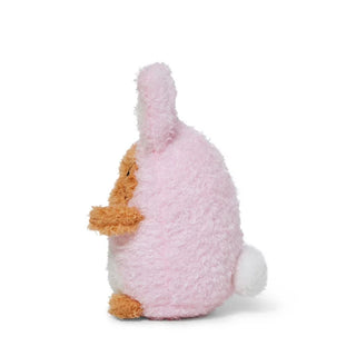 Side view of a Potato plush toy dressed as a pink bunny against a white background