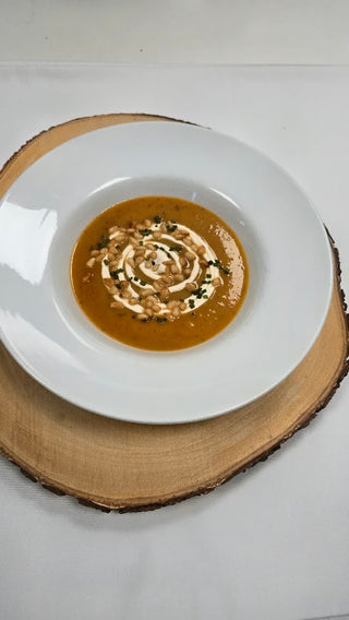 Winter Squash Soup, sour cream & pinenuts