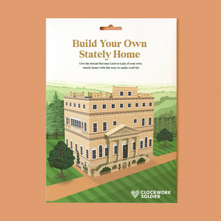 Packaging for 'Build Your Own Stately Home' craft kit by Clockwork Soldier on a brown background.