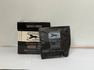 Carefully Curated Morning Dog Coffee box and individual Coffee Bag on a white background