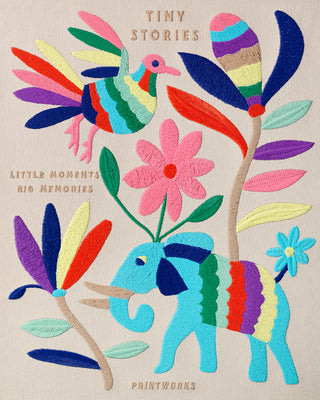 Beige photo album book Tiny Stories with multicolour embroidery depicting an elephant, bird and flowers
